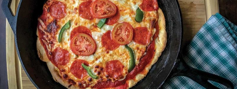 pizza in cast-iron pan
