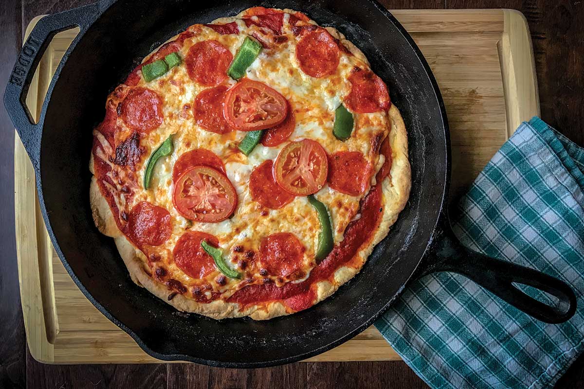 Cast iron pizza, finished under the broiler : r/castiron