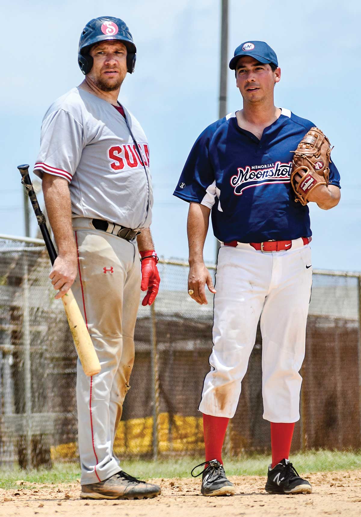 two players in a sandlot game