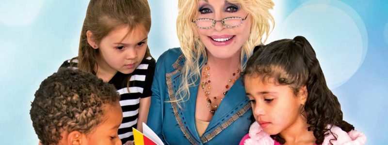 Dolly reads a book to children