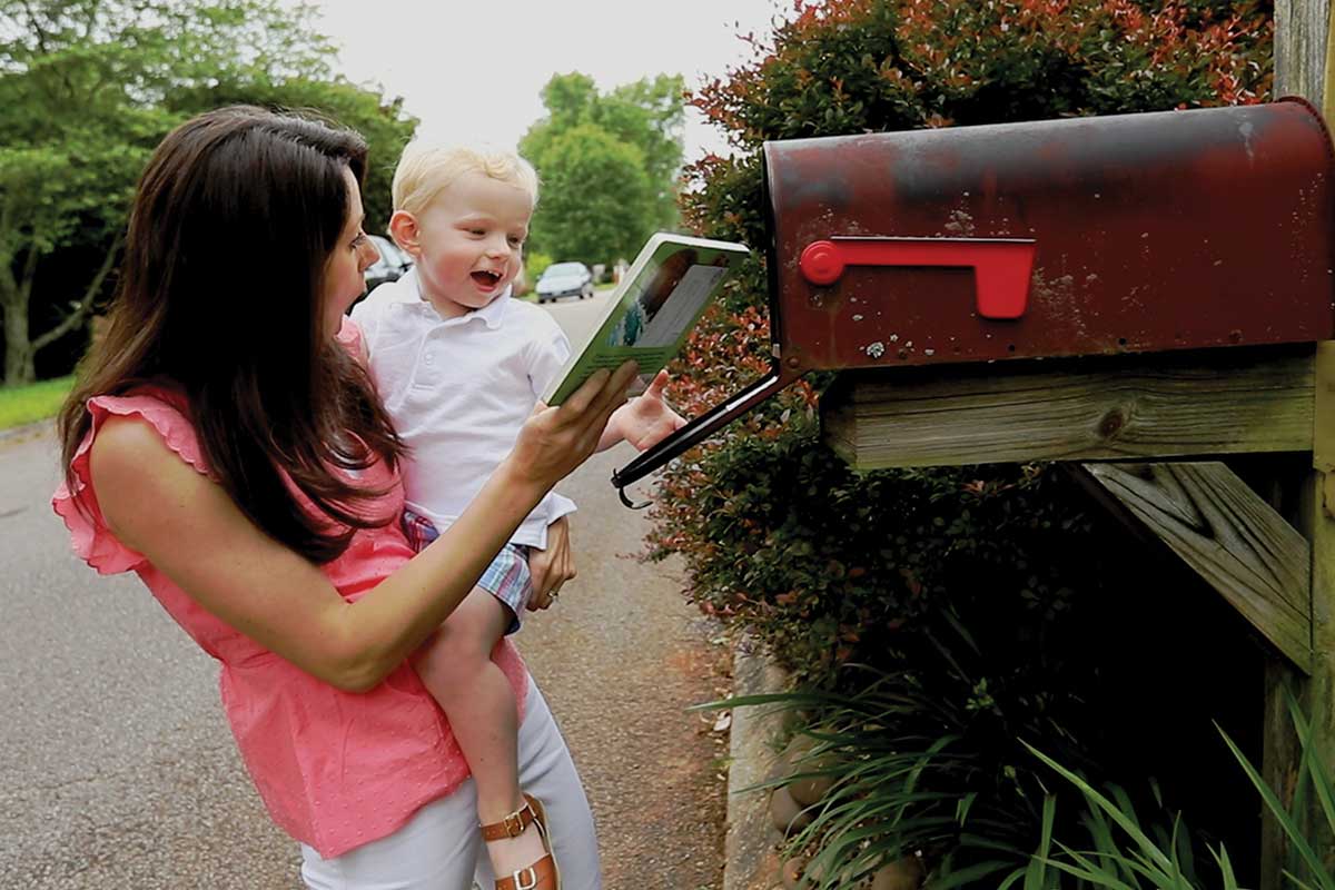 mother and child check mailbox