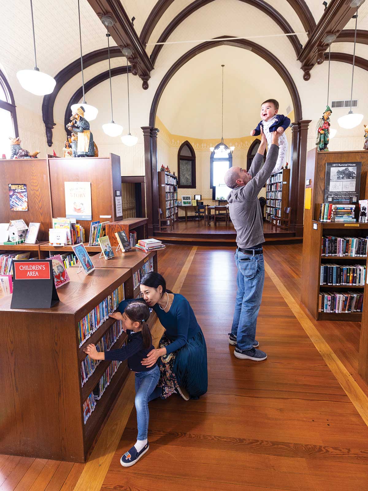 family inside the Round Top Library