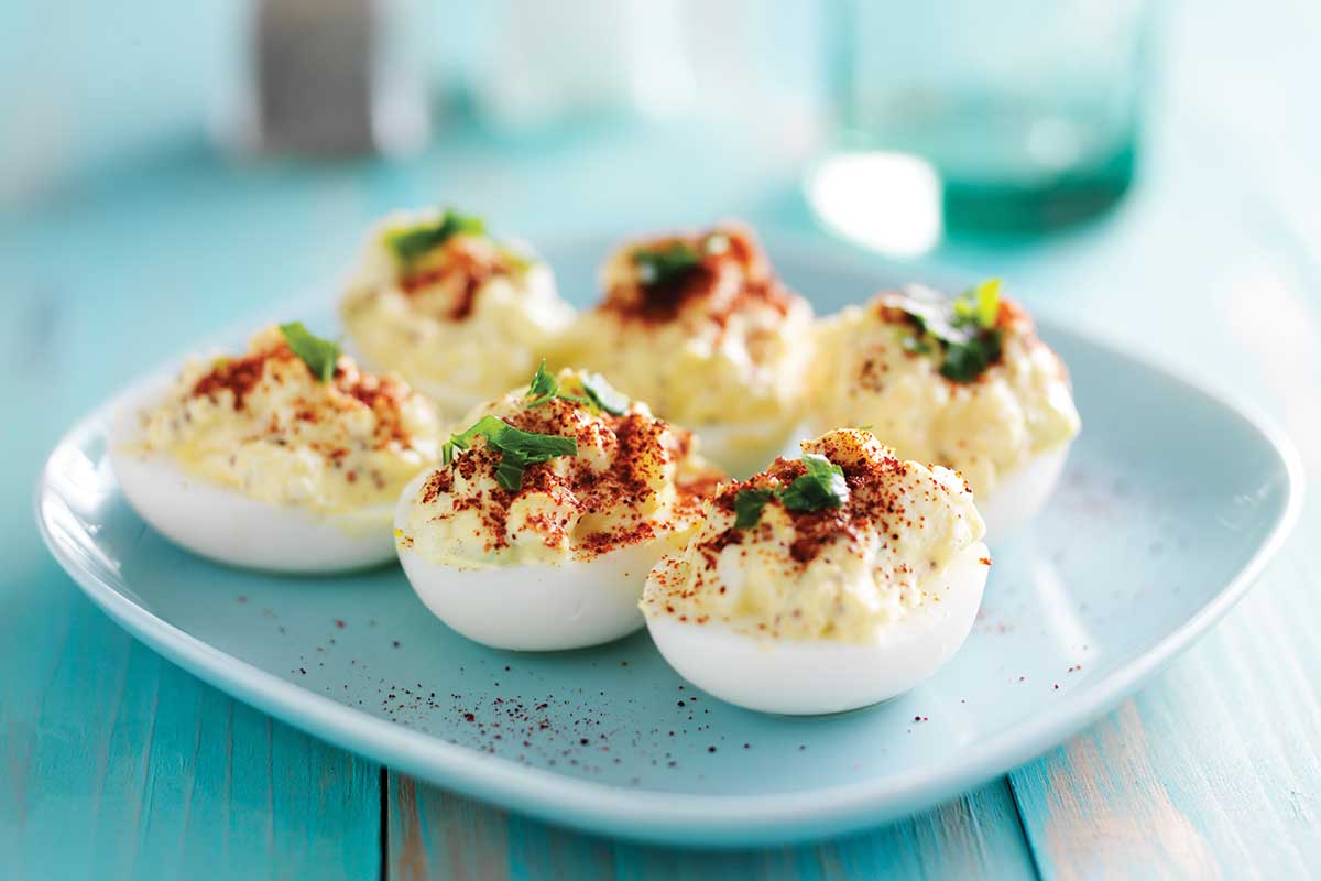 deviled eggs on turquoise blue plate