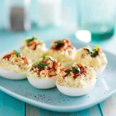 deviled eggs on turquoise blue plate