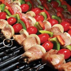 Shish kebabs cooking on a grill